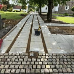 Ny belægning til Kirke