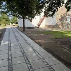 Ny belægning til Kirke